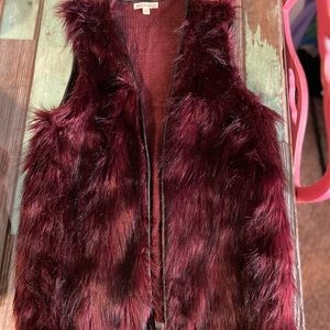 Small red fuzzy vest